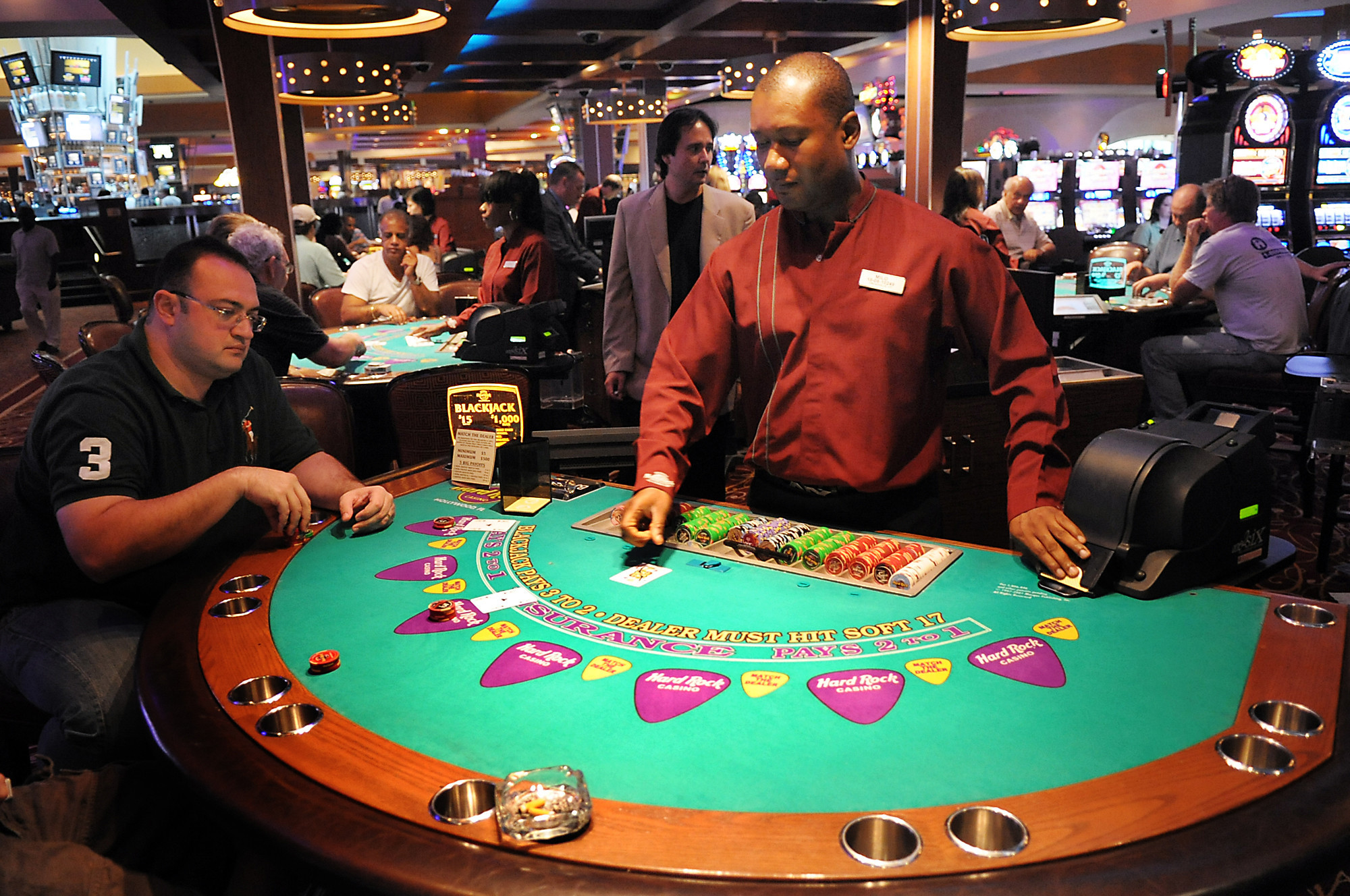 Man sitting alone at casino table